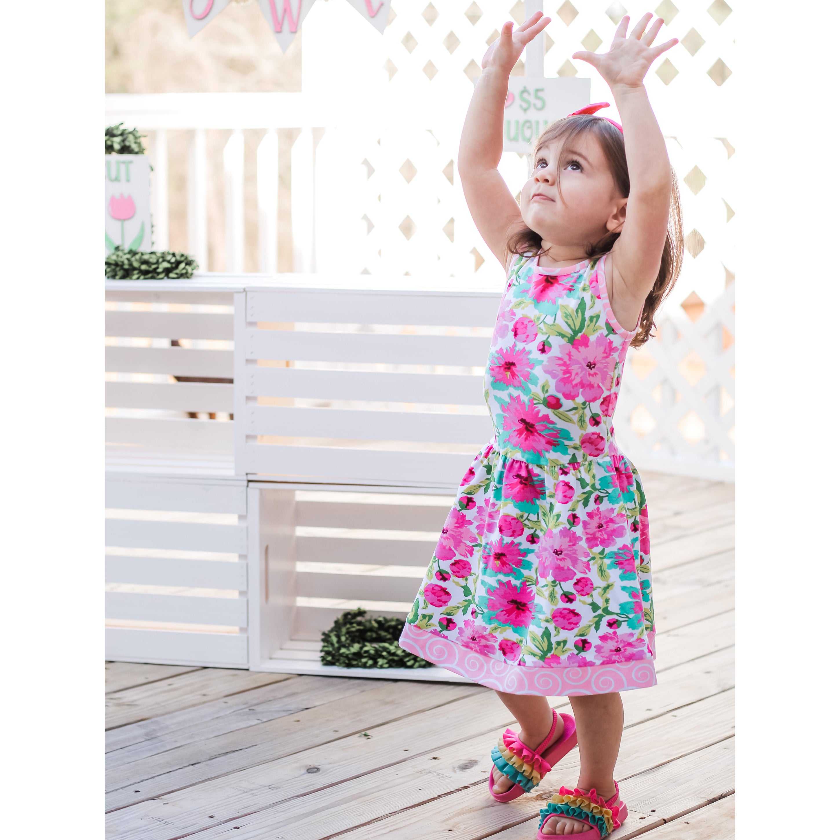 AnnLoren Little & Big Girls Floral Dress in green and pink, showcasing a vibrant floral pattern and sleeveless design, perfect for spring and summer.